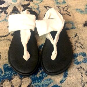 Sanuk black and white sandals. Great condition. Size 8.